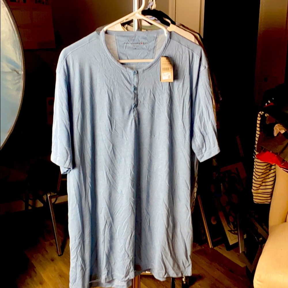 Light blue button collar tee